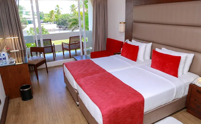 غرفة بريميوم ثلاثية بسرير مزدوج وسرير فردي، Pegasus Reef Hotel 1/3