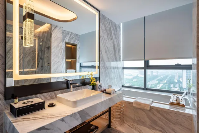 غرفة ديلوكس بسرير كينج وسرير كوين، Pullman Suzhou Zhonghui 4/5