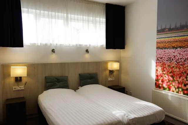 جناح بسرير كوين وسريرين منفصلين بغرفة نوم واحدة، Hotel Van Saaze 2/5
