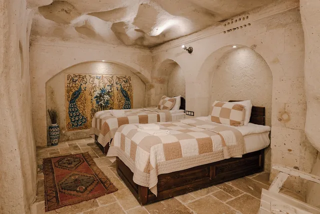 غرفة ديلوكس ثلاثية بسرير كوين وسرير فردي، Cappadocia Cave Suites Boutique Hotel Special Class 1/2