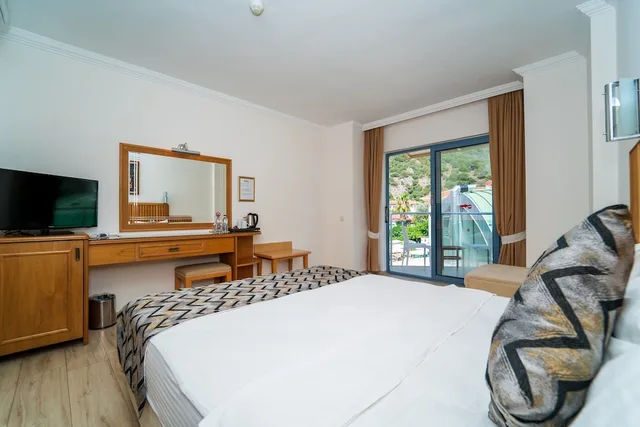 غرفة قياسية بسرير مزدوج أو سريرين منفصلين بإطلالة على الحديقة بشرفة، Belcehan Deluxe Hotel 2/9