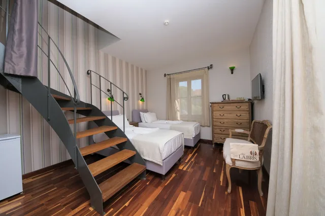 غرفة عائلية رباعية بسرير مزدوج وسريرين منفصلين بشرفة بغرفتي نوم، Cunda Labris Hotel 5/5