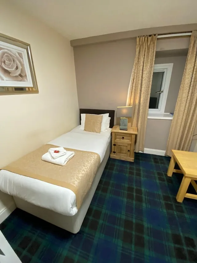 غرفة قياسية مفردة بسرير فردي بحمام مشترك، Waverley Guest House 1/2