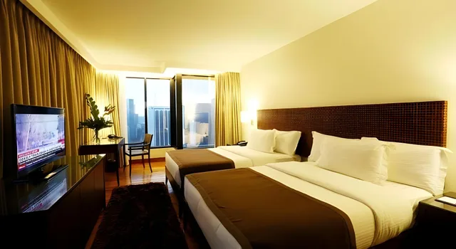 غرفة ديلوكس بسرير مزدوج وسرير فردي، City Garden Grand Hotel 1/1