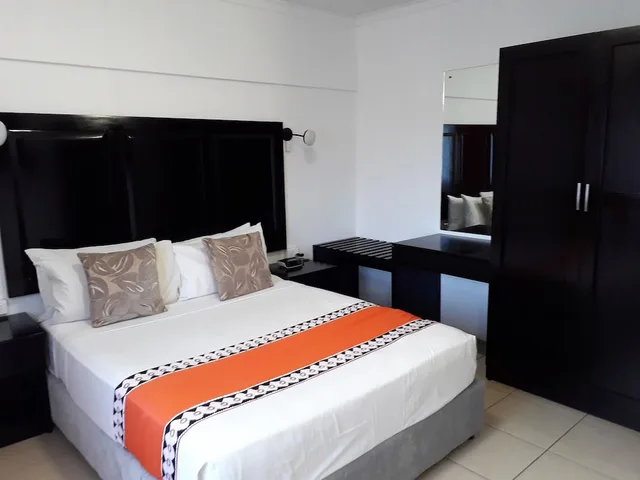 شقة ديلوكس بسريرين منفصلين بغرفتي نوم مع أريكة، Suva Motor Inn 1/9