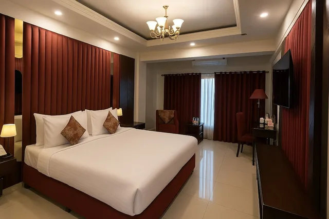 غرفة ديلوكس بسرير كينج، ENVOY CONTINENTAL HOTEL 1/4