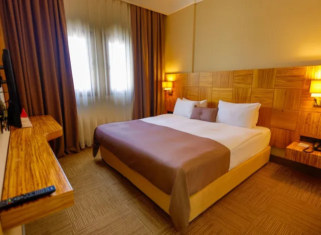 جناح جونيور بسرير كوين وسريرين منفصلين، Ramada by Wyndham Cappadocia 1/7