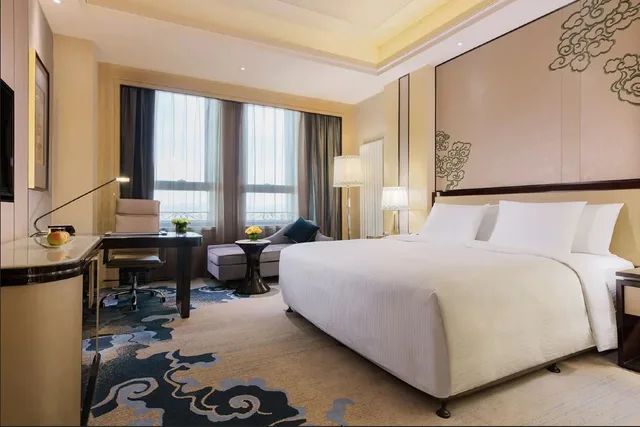 غرفة ديلوكس بسرير كينج، Wanda Realm Chifeng Hotel 1/2