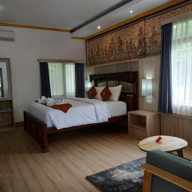 غرفة بسرير مزدوج أو سريرين منفصلين بإطلالة على المسبح، Melasti Beach Bungalows And Spa 2/10