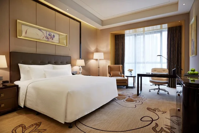 غرفة تنفيذية بسرير كينج، Wanda Realm Zhangzhou 1/8