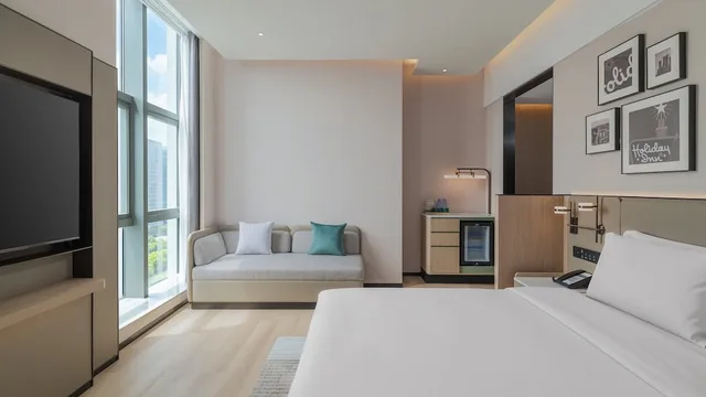 غرفة بريميوم بسرير كينج في طابق مرتفع، Holiday Inn Wuhu Jiangbei New Area by IHG 1/7
