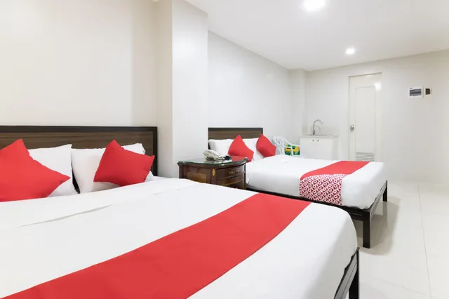 جناح عائلي بسرير كينج وسرير بطابقين، OYO 152 Sangco Condotel 1/3