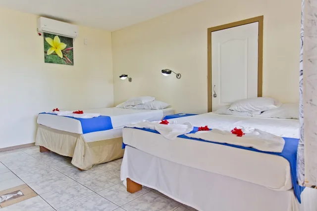 غرفة عائلية بسرير مزدوج وسرير فردي بغرفة نوم واحدة، Le Uaina Beach Resort 4/8