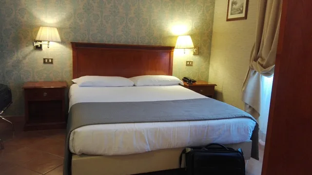 غرفة اقتصادية بسرير كوين، Hotel Nuvo 4/6