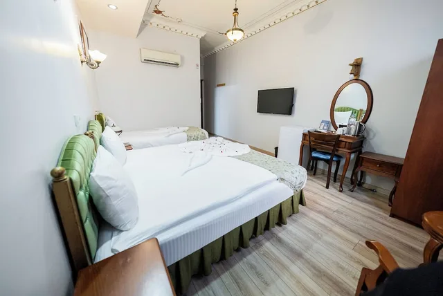 غرفة اقتصادية ثلاثية بسرير مزدوج وسرير فردي، Basileus Hotel 3/8