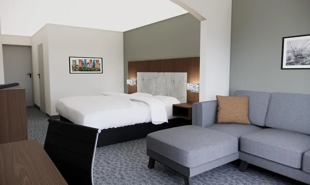 جناح بسرير كينج مع أريكة، Quality Suites Austin South St. Elmo District 2/5