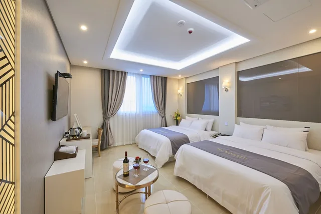 غرفة قياسية بسريرين مزدوجين، Madrid Hotel Gwangju 2/4