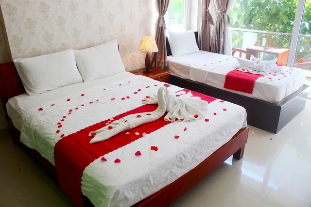غرفة عائلية بسريرين مزدوجين بإطلالة على الحديقة، Hai Yen Resort 1/10