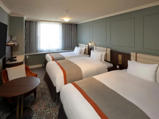 غرفة سوبيريور بسريرين منفصلين مع سرير إضافي في المبنى الرئيسي، Sapporo Grand Hotel 1/9