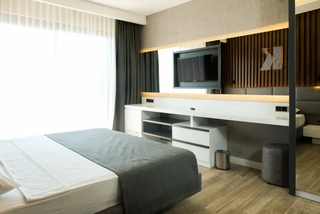 غرفة ديلوكس عائلية بسرير كوين وسريرين منفصلين، Kaila Beach Hotel 4/6