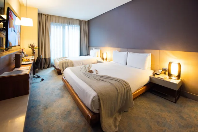 غرفة قياسية ثلاثية بثلاثة أسرّة، Dosso Dossi Hotels and SPA Downtown 2/7