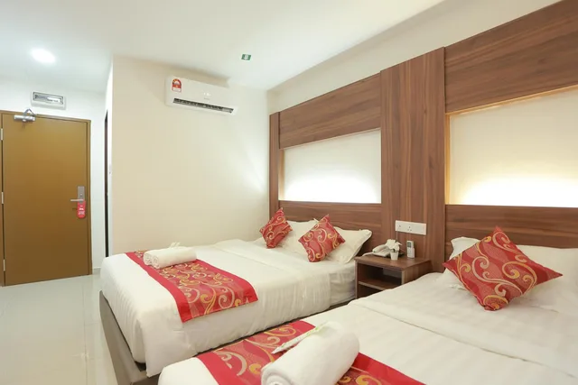 غرفة ديلوكس ثلاثية بسرير كوين وسرير فردي، Bitz Bintang Hotel 1/4