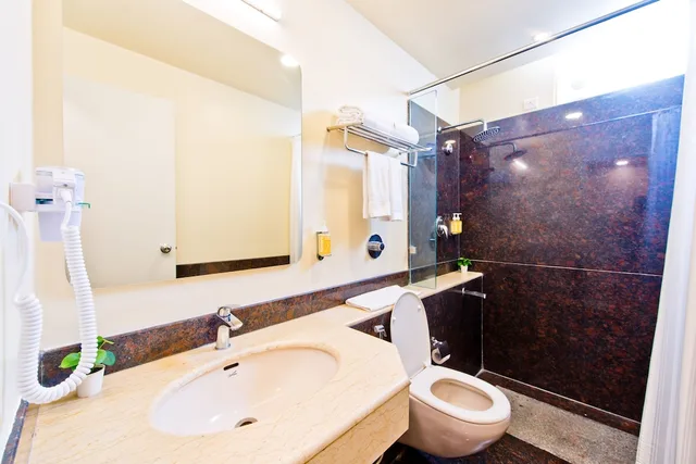 جناح ديلوكس بسرير كينج، Bloom Hotel Indiranagar 4/5