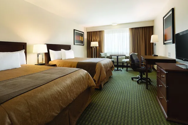 Business, 2 Queen Beds, Travelodge Hotel by Wyndham Weyburn 1/3