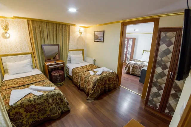 غرفة عائلية بسرير مزدوج وسريرين منفصلين، Meddusa Hotel 1/2