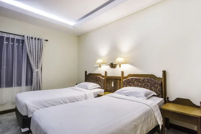 غرفة قياسية بسريرين منفصلين بإطلالة على الحديقة، Bali Bungalo Hotel 1/10