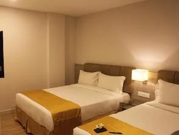 غرفة ديلوكس ثلاثية بسرير كينج، NU Hotel KL Sentral 1/2