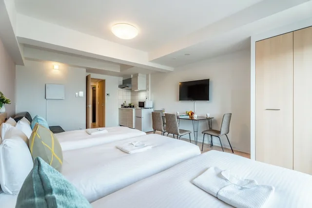 غرفة عائلية بثلاثة أسرّة مع أريكة في طابق مرتفع، Eslead Hotel Namba South I 5/10
