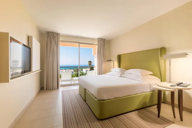 جناح بإطلالة على البحر بغرفة نوم واحدة مع أريكة، NAU Sao Rafael Suites 1/7