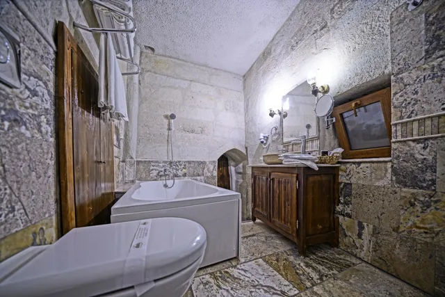 غرفة عائلية بسرير كينج وسرير فردي، Maccan Cave Hotel 4/6