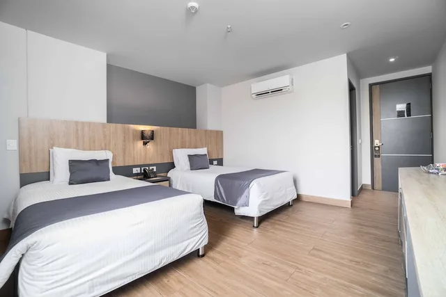 غرفة قياسية بسريرين منفصلين، Hotel Plaza del Lili 1/4