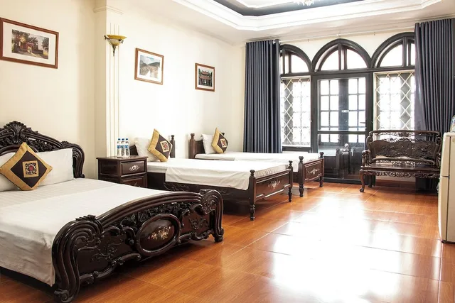 غرفة عائلية رباعية بسريرين منفصلين وسرير كينج بإطلالة على المدينة بشرفة، Group Nest Hotel 2/3