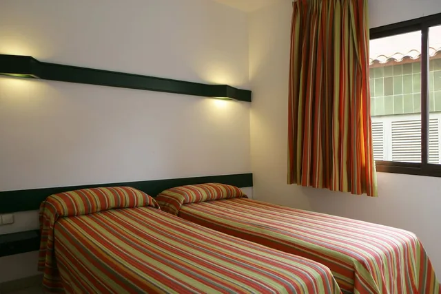 شقة عائلية بثلاثة أسرّة بإطلالة على المدينة بغرفة نوم واحدة، Apartamentos Rosanna 1/3