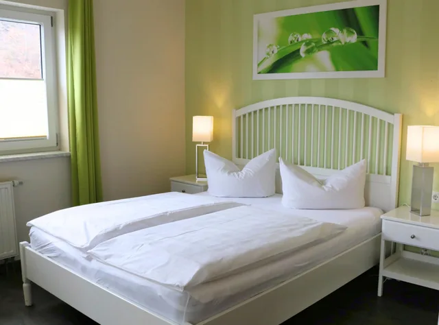غرفة بسرير مزدوج بشرفة، REGIOHOTEL Schanzenhaus Wernigerode 1/6