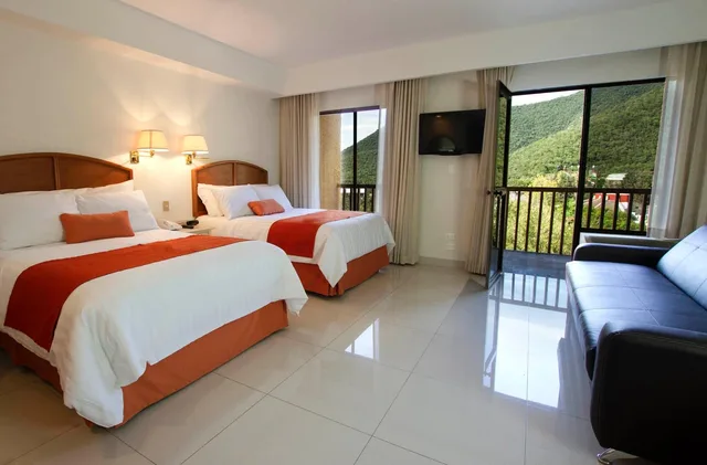 جناح ديلوكس رباعي، Bahia Escondida Hotel 1/1