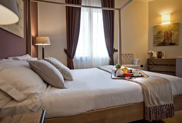 غرفة ديلوكس عائلية بسرير كينج بإطلالة على المدينة مع أريكة، Delle Vittorie Luxury Suites & Rooms 6/10