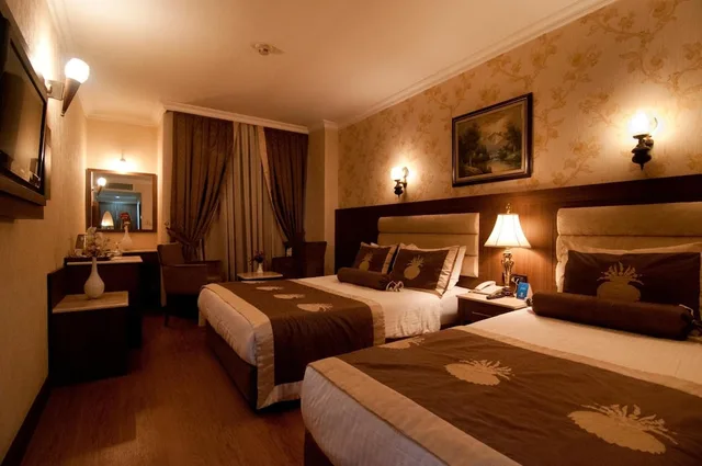 غرفة قياسية بسرير مزدوج وسرير فردي، Grand Hilarium Hotel 2/10
