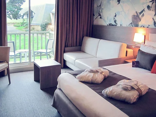 غرفة بريفيليج بسرير مزدوج مع أريكة، Hotel Mercure Omaha Beach 5/9