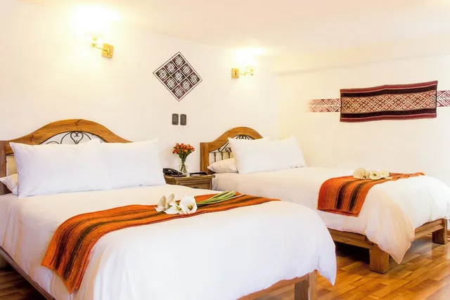 غرفة سوبيريور ثلاثية بسرير فردي بإطلالة على الفناء بغرفة نوم واحدة، Casa San Blas Boutique Hotel 2/6