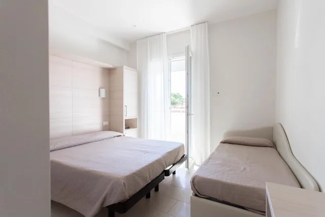 غرفة رباعية، Hotel Primiana 8/10
