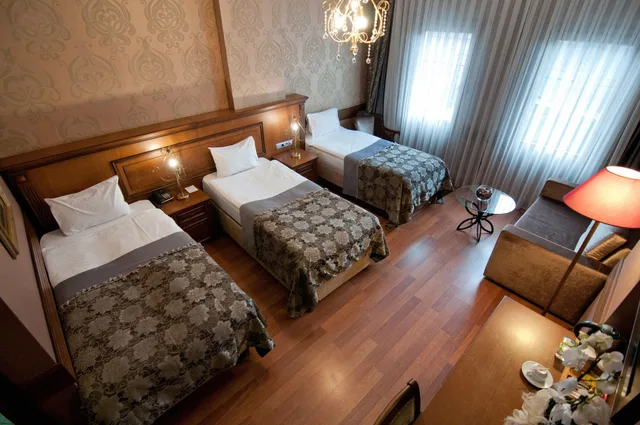 غرفة سوبيريور ثلاثية بسرير كينج وسرير فردي بإطلالة على البحر، FERMAN HOTEL 4/5
