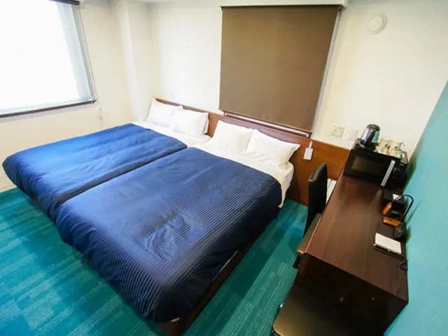 غرفة بسريرين منفصلين، Hotel Livemax Hashima Ekimae 1/4