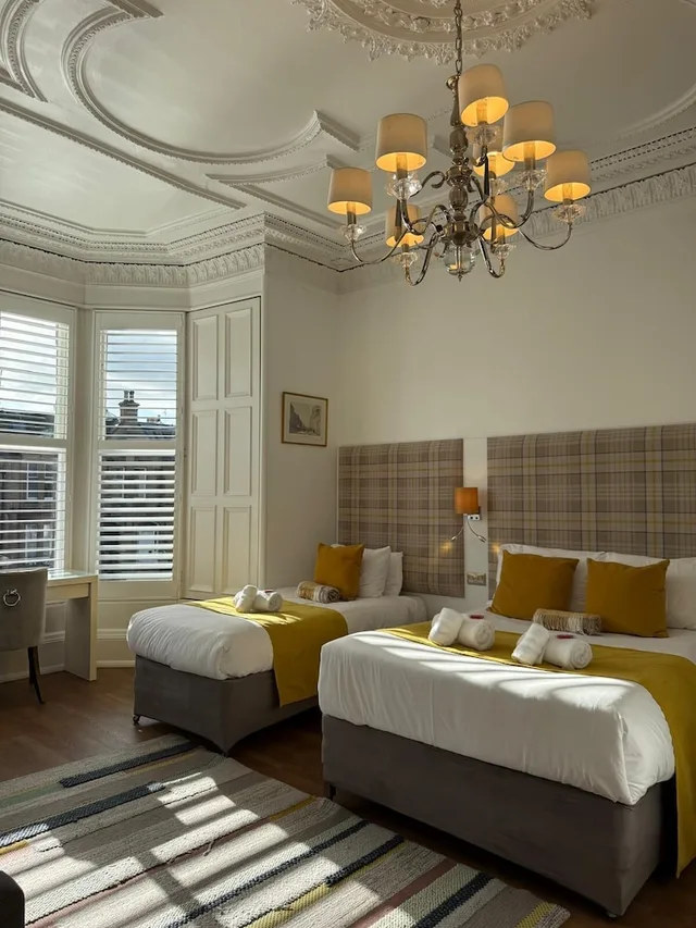 غرفة عائلية بسرير مزدوج وسرير فردي، The International Guest House 7/10