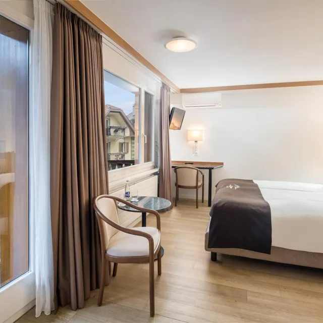 Room, Double Bed, Street View, Seehotel Pilatus 1/3