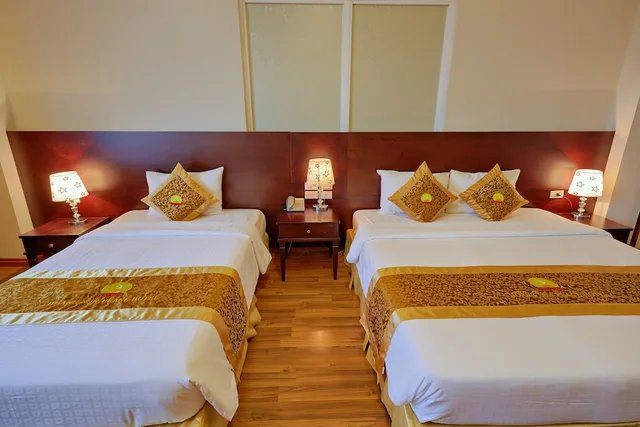 غرفة ديلوكس عائلية بسرير كوين وسرير فردي، Hoang Son Peace Hotel 2/6