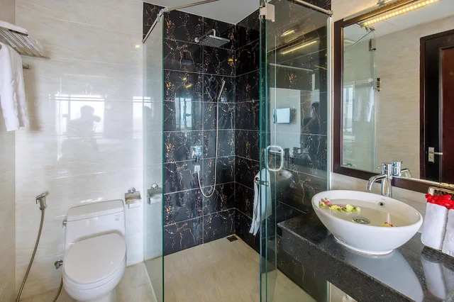Deluxe, Single, 2 Double Beds, City View، Ocean Haven Hotel 3/4